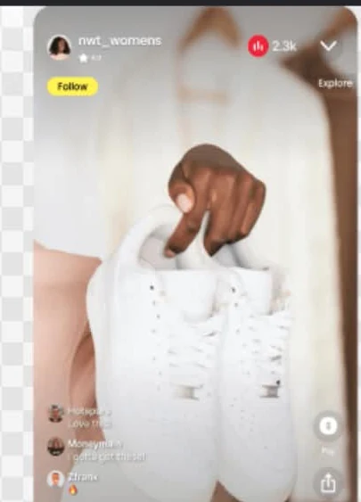 Live-shopping screenshot showing white trainers being presented during a Whatnot stream.